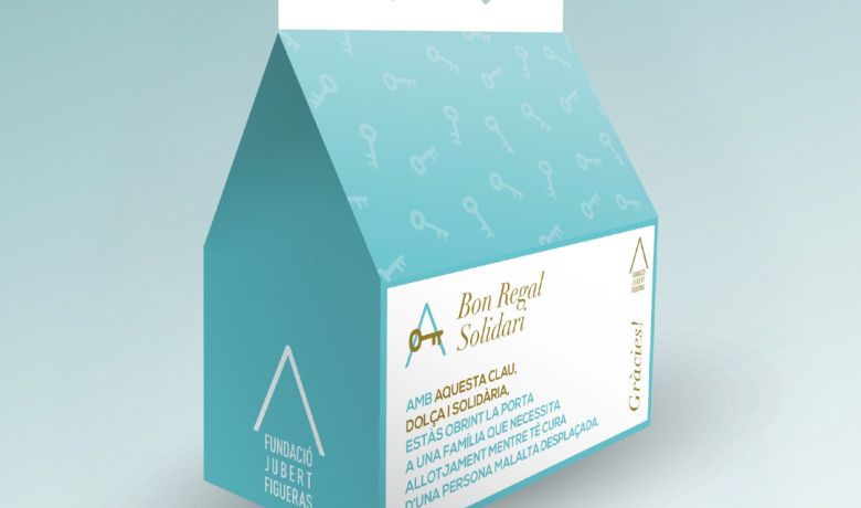 El regal solidari de la Fundació Jubert Figueras és una capsa en forma de caseta de color turquesa.