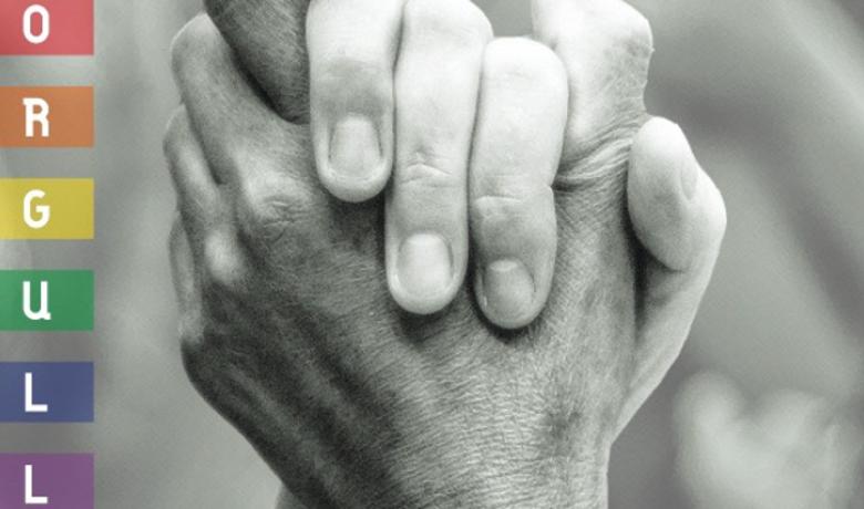 Dues mans entrellaçades i els colors de l'arc de sant Martí.